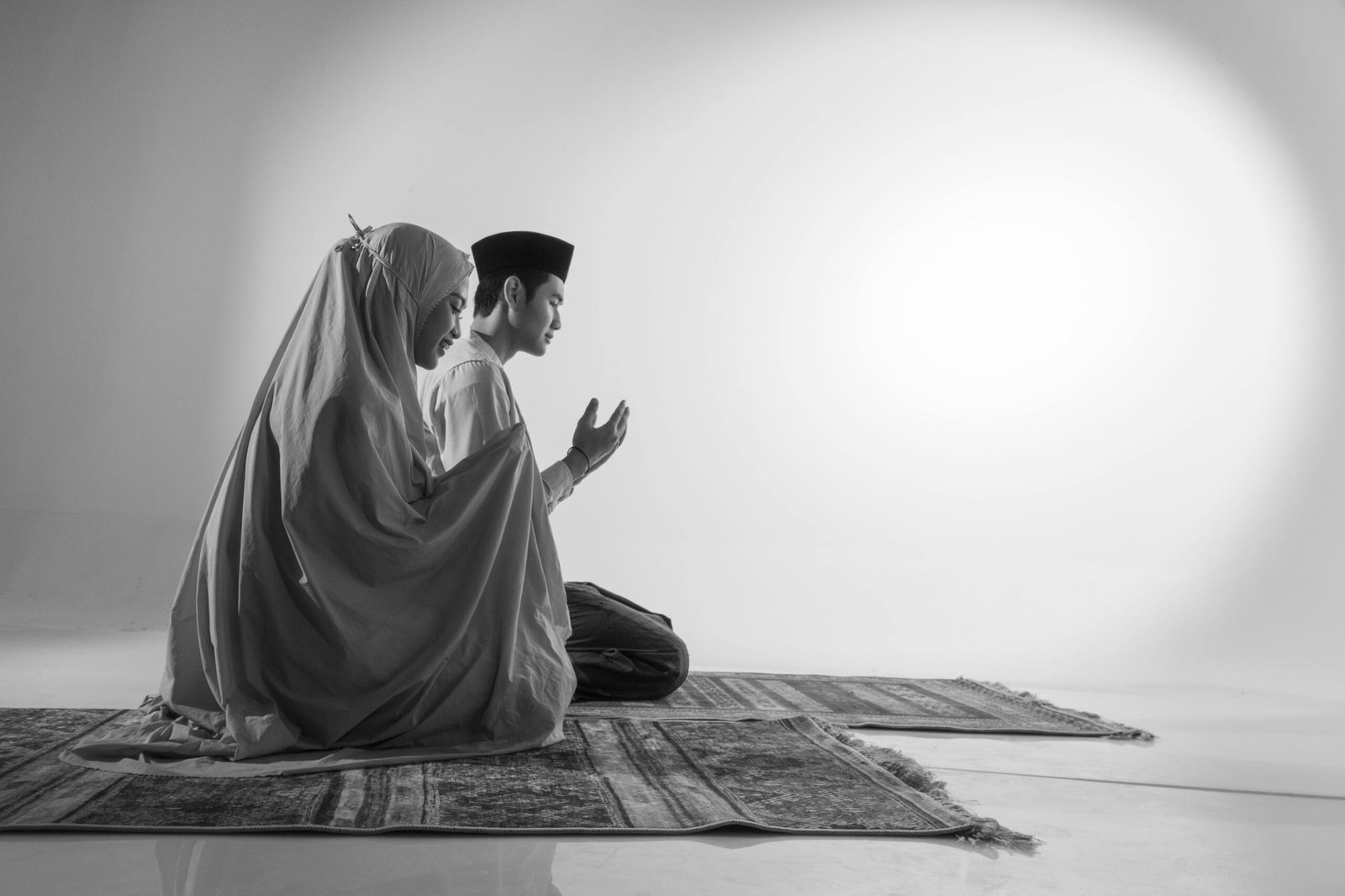 Muslim couple praying together illustrating the role of a wali in Islamic marriage

